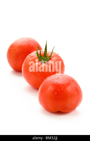 Drei Tomaten auf weißem Hintergrund Stockfoto