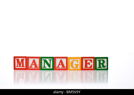 Bunte Kinder-Blöcke Rechtschreibung MANAGER Stockfoto