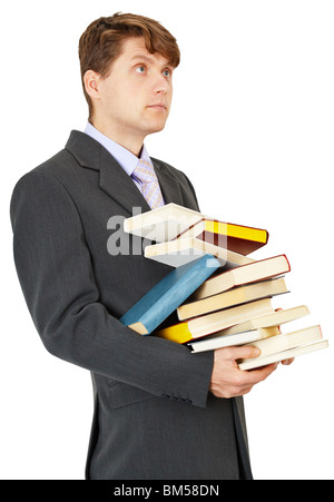 Student hält eine Menge Bücher, isoliert auf weißem Hintergrund Stockfoto