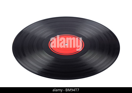 Staubige Vinyl-Schallplatte mit roten Etikett isoliert auf weißem Hintergrund. Geringe Schärfentiefe Stockfoto