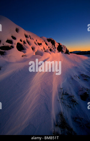 Schnee bei Sonnenuntergang Stockfoto