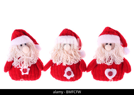 Drei Weihnachtsmänner isoliert auf weißem Hintergrund Stockfoto