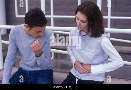 Unglückliche paar finden heraus, dass sie ist schwanger Stockfoto