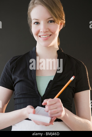 Kellnerin schriftliche Bestellung Stockfoto