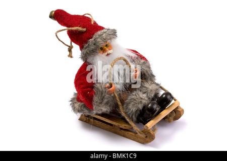 Weihnachtsmann auf seinem Schlitten ohne Rentier Stockfoto