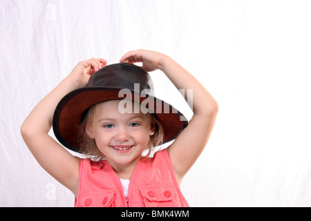 Junge Cowgirl in einem Cowboy-Hut Stockfoto