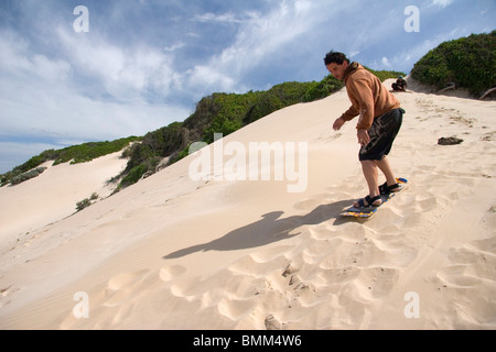 Jeffreys Bay, Südafrika. Sandboarding bleibt eine große Aktivität in Südafrika. , Stockfoto