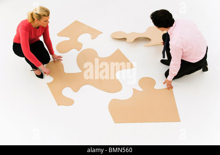 Arbeitest du für Geschäftsleute Veredelung Puzzle Stockfoto