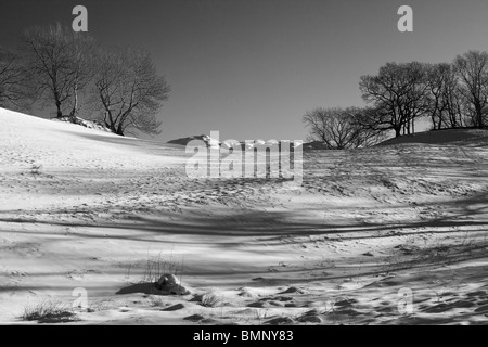 Der Gipfel der Wansfell Gipfel oberhalb des gefrorenen Feld auf dem Weg bis zu niedrigen Hecht auf der Fairfield-Hufeisen Stockfoto