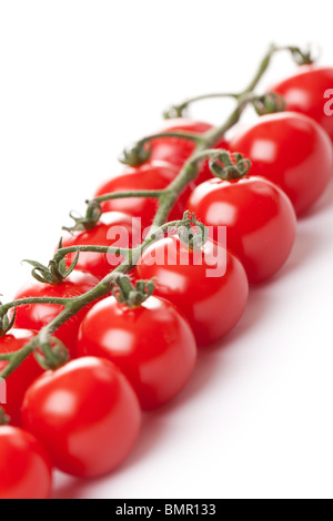 Kirschtomaten auf weißem Hintergrund Stockfoto