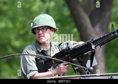 Einen getarnten Soldaten eine Pistole Waffe Stockfoto