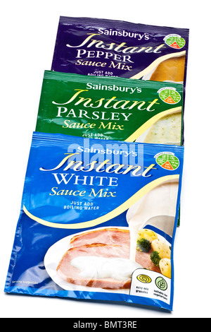 Drei Pakete von Sainsburys instant sauce mixen Stockfoto