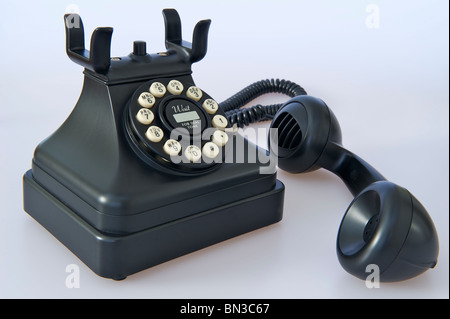 Vintage-Stil Telefon mit Empfänger aus dem Schneider. Stockfoto