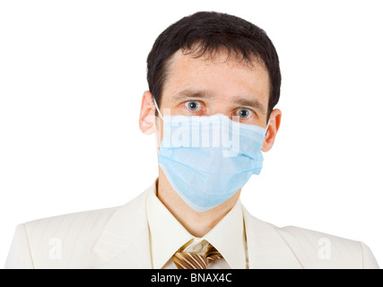 Überrascht junger Geschäftsmann in der medizinischen Maske Stockfoto