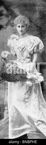 Frau mit Blumen und Korb Stockfoto