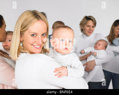 Gruppe von Müttern und Kindern Stockfoto