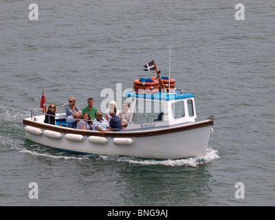 Touristen auf einem Boot zu fahren, um Fowey, Cornwall, UK Stockfoto