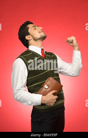 Geschäftsmann, ballte die Faust vor Aufregung Stockfoto