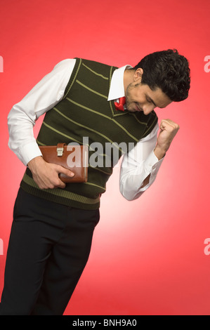 Geschäftsmann, ballte die Faust Stockfoto