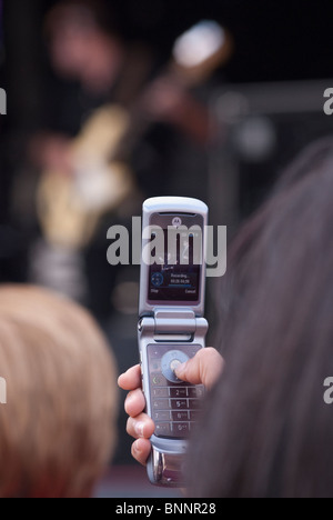 Aufnahme live-Event auf dem Handy Stockfoto