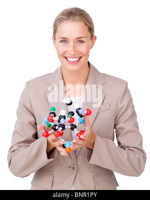 Junge Geschäftsfrau hält ein Molekül Stockfoto