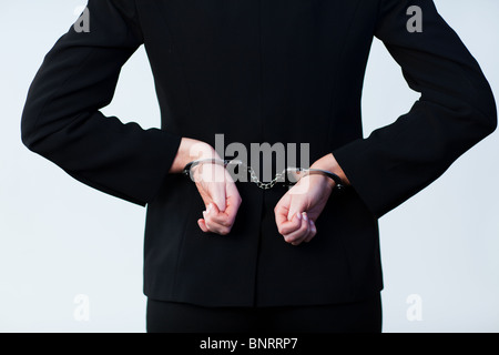 Unternehmer mit Handschellen gefesselt Stockfoto