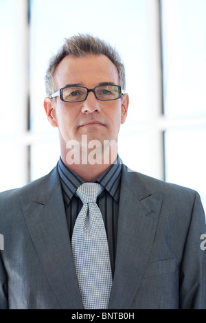 Leitenden Geschäftsmann mit Brille Stockfoto