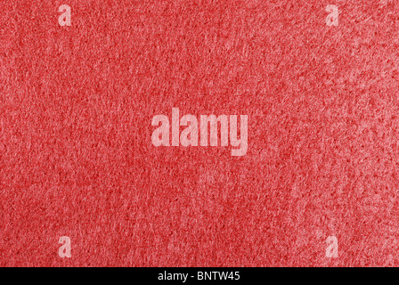 Roter Stoff Nahaufnahme für Nutzung im Hintergrund. Stockfoto
