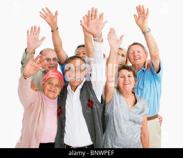 Eine Gruppe von Menschen, die winken Stockfoto