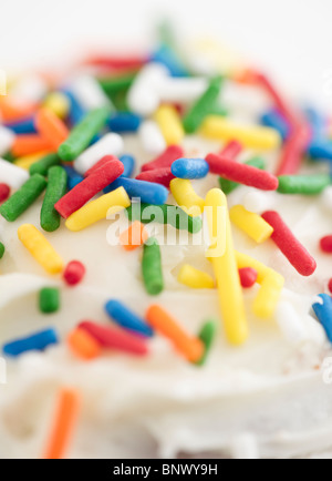 Bunte Streusel auf cupcake Stockfoto