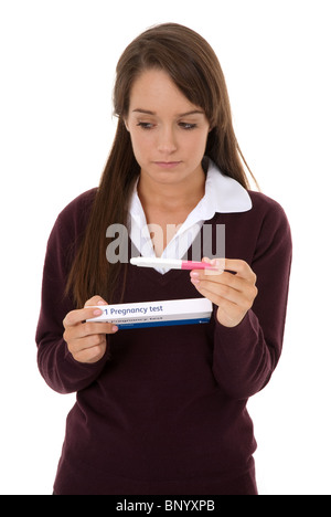 Schulmädchen hält eine Schwangerschaft Test-kit Stockfoto