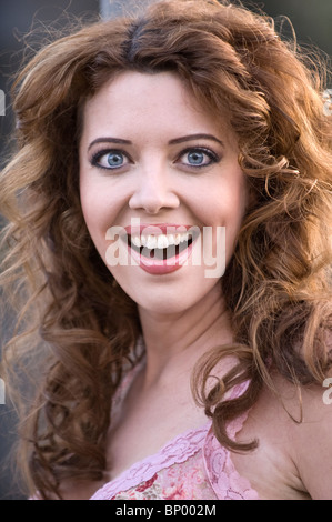 A young white woman with a surprised and shocked look on her face Stockfoto