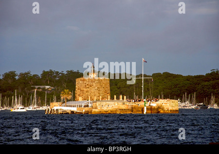 Fort Denison beleuchtet durch die letzten Strahlen der Sonne Sydney Harbour NSW Australia Stockfoto