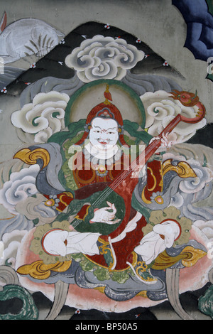 Detail eines Wandbildes im Kloster Tashichho Dzong in Thimpu, Bhutan. Stockfoto