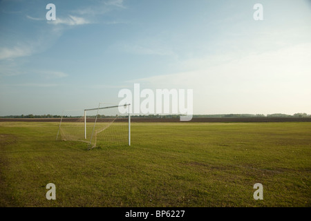 Soccer goal in the middle of an empty field Stockfoto