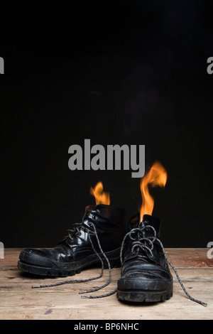 Lederstiefel in Brand Stockfoto