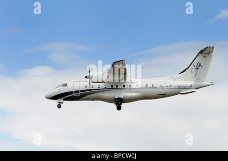 Dornier 328-110 von Skywork Airlines, Schweiz kommt an RAF Fairford, die Patrouille Suisse aerobatic Anzeige Mannschaft zu unterstützen Stockfoto