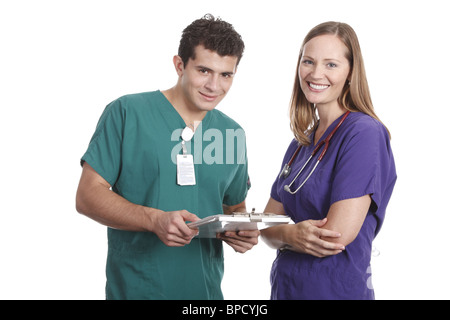 Medizinisches Personal über Patientenakte Stockfoto
