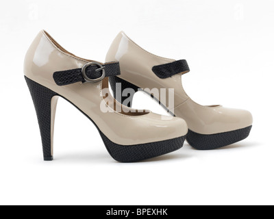 Paar Damen Patent Creme und schwarze High Heels Mary Jane Stiletto Schuhe Stockfoto