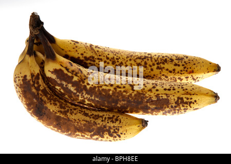 Haufen über reife Bananen auf weißem Hintergrund Stockfoto