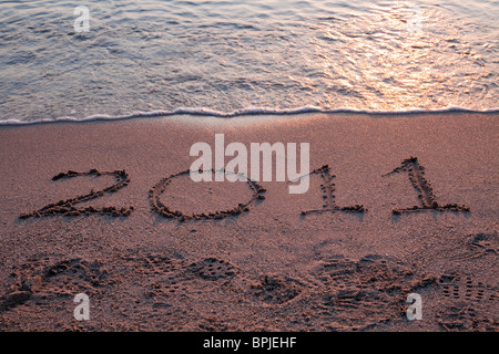 Jahr 2011 Datum geschrieben auf dem Sand des Strandes Stockfoto