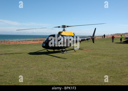 Eurocopter AS-350BB Eichhörnchen HT1 Hubschrauber bei Cromer Karneval, Norfolk, Großbritannien Stockfoto