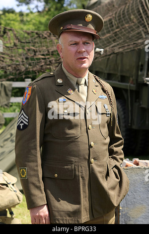 WW2-Reenactment-Mitglied in der Uniform von einem technischen Sargeant in der US Army Stockfoto