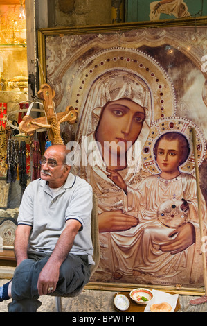 Verkäufer der religiösen Gemälden an der Via Dolorosa in Jerusalem Stockfoto