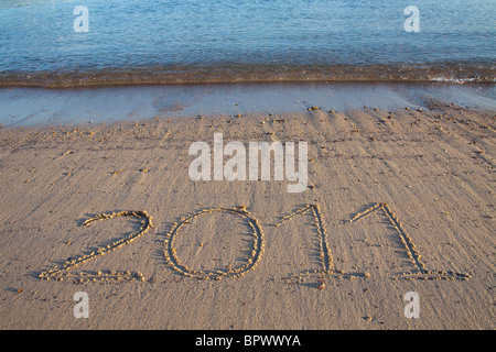 Jahr 2011 Datum geschrieben auf dem Sand des Strandes Stockfoto