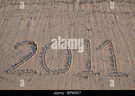 Jahr 2011 Datum geschrieben auf dem Sand des Strandes Stockfoto