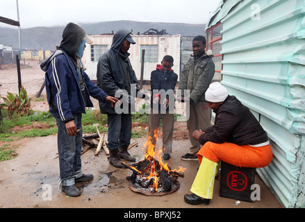 Südafrika: bei einer Firesite in einem Township in der Weinregion der westlichen Kap-Provinz in der Nähe von De Doorns, Hex Valley Stockfoto