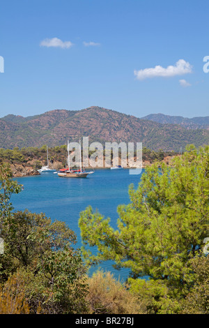 Ausflugsschiffe off Yassica Insel (Wohnung) in der Nähe von Fethiye, Westküste, Türkei Stockfoto