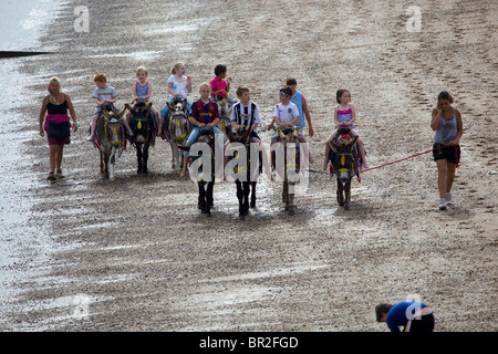 Eselreiten am Strand Cleethorpes North East Lincolnshire Stockfoto