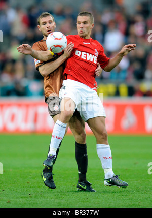 Lukas Podolski Vs Markus Thorandt, Deutsche Bundesliga. Stockfoto